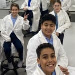 Middle school students observed their cheek cells under a microscope in the lab